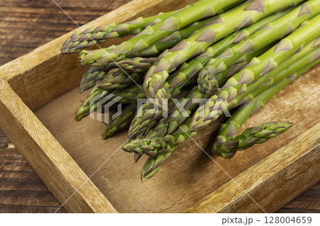 Bundles green asparagus. 128004659