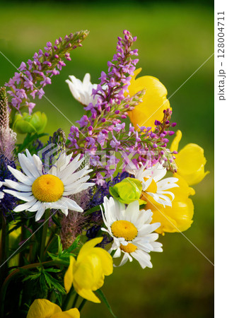 Colorful bouquet of wildflowers collected high in the mountains 128004711
