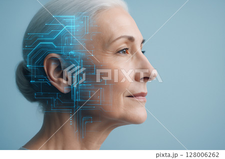 AI generated digital artwork showing a senior woman in profile with half her head overlaid by a transparent blue circuit interface suggesting brain-computer connection and futuristic healthcare 128006262