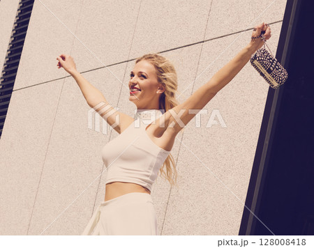Fashionable woman in city Fashionable woman in city 128008418