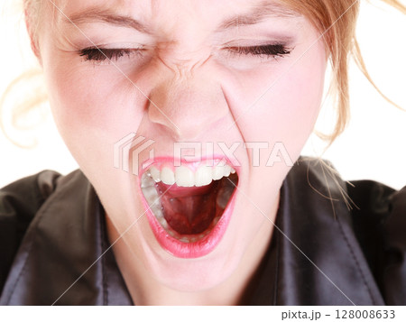 Angry furious woman screaming and pulling messy hair 128008633