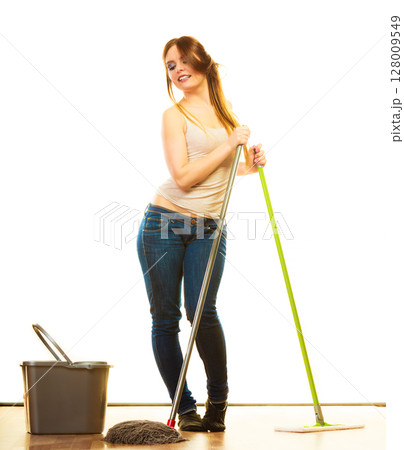 Funny cleaning woman mopping floor 128009549