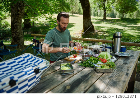 Outdoor Picnic with Fresh Vegetables and Nature 128012871