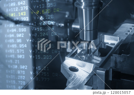 Abstract scene the 5-axis CNC milling machine finish cutting the aero space parts and NC data background. Abstract scene the 5-axis CNC milling machine finish cutting the aero space parts and NC data background. 128015057
