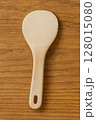 Wooden rice paddle on wooden background natural kitchen utensil top view Wooden rice paddle on wooden background natural kitchen utensil top view 128015080