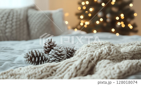 Cozy winter interior featuring Christmas decorations and comforting textures for the holiday season 128018074