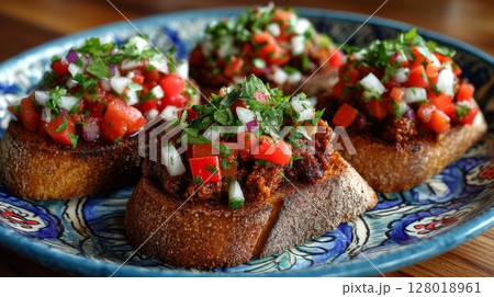 Savory Bruschetta Toasts with Tomato Salsa 128018961