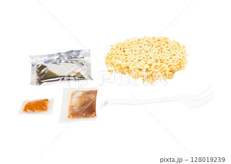 Cup of instant noodles, condiments, plastic forks on white background Cup of instant noodles, condiments, plastic forks on white background 128019239