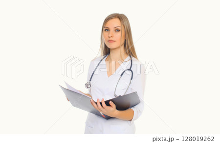 Young woman doctor with stethoscope and folder of documents on white background Young woman doctor with stethoscope and folder of documents on white background 128019262