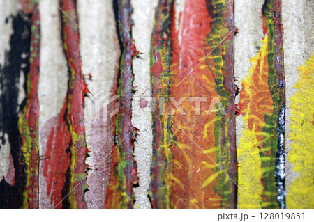 Thick Textured Lined Dirty Dried Scraped Paint in Different Colours Graffiti Overlap Cardboard Background 128019831
