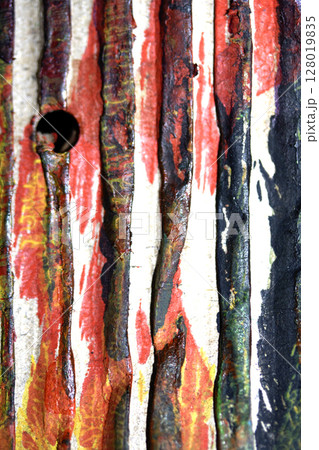 Thick Textured Lined Dirty Dried Scraped Paint in Different Colours Graffiti Overlap Cardboard Background 128019835