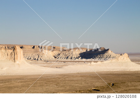 Stunning Mangystau landscape, Kazakhstan. Rock pinnacles view, Bozzhira valley Stunning Mangystau landscape, Kazakhstan. Rock pinnacles view, Bozzhira valley 128020108