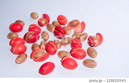 Skin Melinjo fruit and gnetum gnemon seeds on a white background. culinary herbs and food ingredients 128020543