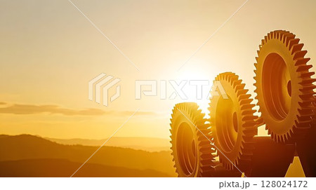 Golden gears silhouette at sunset industrial mechanical background 128024172