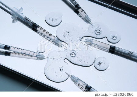 The texture of the injection preparation and syringes in the tray. The texture of the injection preparation and syringes in the tray. 128026860