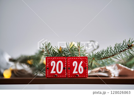 Two boxes from an Advent calendar that make up the number 2026. 128026863