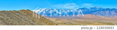 Aerial of Snow-Capped Mt Charleston and Desert Hills 128030683