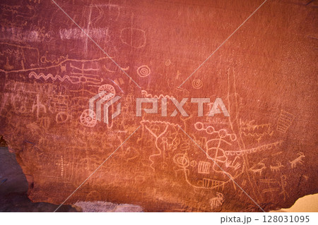 Ancient Petroglyphs on Nevada Rock Face Eye-Level Perspective Ancient Petroglyphs on Nevada Rock Face Eye-Level Perspective 128031095