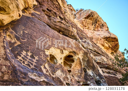 Ancient Petroglyphs in Red Rock Nevada Eye-Level View Ancient Petroglyphs in Red Rock Nevada Eye-Level View 128031178