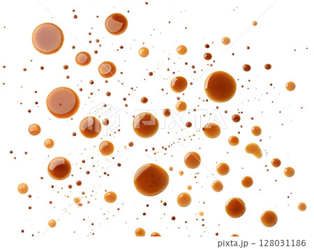 Tea or coffee stains and droplets isolated on white background Tea or coffee stains and droplets isolated on white background 128031186