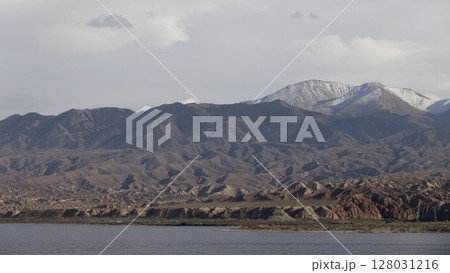 mountain range of Tien Shan against the sky in kyrgyzstan 128031216