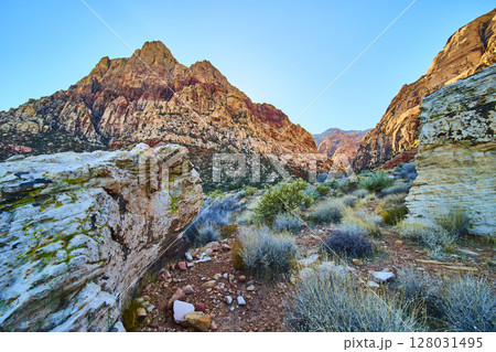 Red Rock Canyon Desert Landscape with Rugged Mountains at Golden Hour Red Rock Canyon Desert Landscape with Rugged Mountains at Golden Hour 128031495