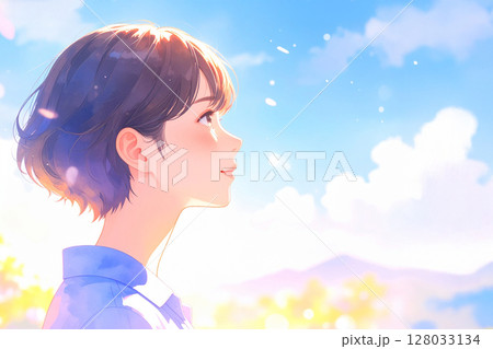 朝焼けを背景に未来を見据える女性 128033134