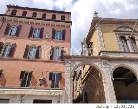 Verona, Italy - May 12, 2025: Street view of Piazza Dei Signori Verona city Italy in front of historical building Palace of the Podesta Verona, Italy - May 12, 2025: Street view of Piazza Dei Signori Verona city Italy in front of historical building Palace of the Podesta 128033732