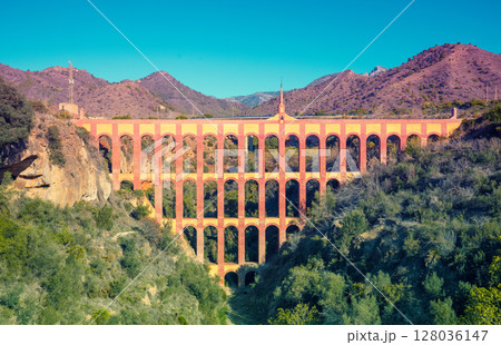 View of Aqueduct Eagle (El Acueducto del Aguila) in Nerja, Malaga, Spain 128036147