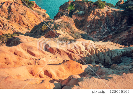 Rocky seascape in the Algarve region in the Atlantic Ocean, Portugal, Europe Rocky seascape in the Algarve region in the Atlantic Ocean, Portugal, Europe 128036163