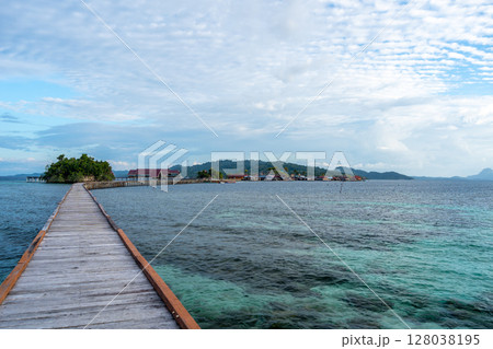 Wooden jetty to Bajo village, Pulau Papan, Sulawesi, Indonesia Wooden jetty to Bajo village, Pulau Papan, Sulawesi, Indonesia 128038195