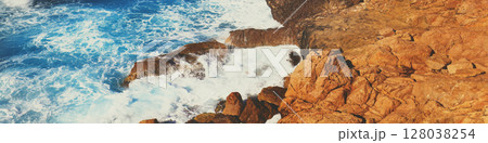 Rocky seashore. Stormy sea. Beautiful wild nature. Horizontal banner Rocky seashore. Stormy sea. Beautiful wild nature. Horizontal banner 128038254