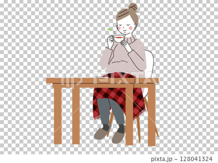 温かいお茶とひざ掛けで体を温めている妊婦さん 128041324
