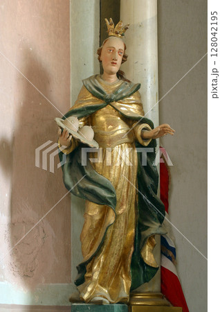 Saint Agatha of Sicily, statue on the Saint Elizabeth altar in the Church of the Three Kings in Komin, Croatia Saint Agatha of Sicily, statue on the Saint Elizabeth altar in the Church of the Three Kings in Komin, Croatia 128042195