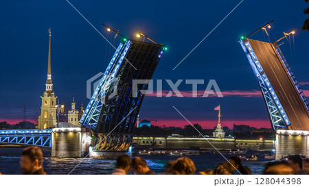 View of the opening Palace Bridge timelapse, which spans - the spire of Peter and Paul Fortress 128044398