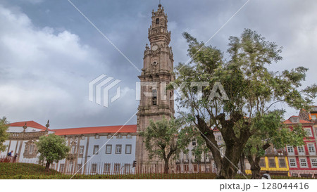 Bell tower of the Clerigos Church in cloudy blue sky background timelapse hyperlapse Bell tower of the Clerigos Church in cloudy blue sky background timelapse hyperlapse 128044416