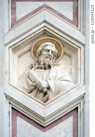 Saint Bartholomew the Apostle, relief on the facade of Basilica of Santa Croce (Basilica of the Holy Cross) - famous Franciscan church in Florence, Italy 128044525