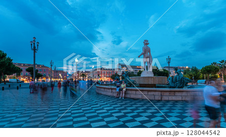 The Fountain du Soleil on Place Massena square Nice day to night timelapse, French Riviera, Cote d'Azur, France 128044542