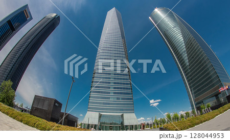 Skyscrapers timelapse hyperlapse in the Four Towers Business Area with the tallest skyscrapers in Madrid and Spain 128044953