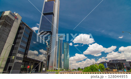 Skyscrapers timelapse hyperlapse in the Four Towers Business Area with the tallest skyscrapers in Madrid and Spain 128044955