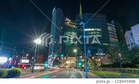 Milan skyline with modern skyscrapers in Porta Nuova business district night timelapse hyperlapse in Milan, Italy 128045006