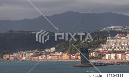 Aerial timelapse of Torre VTS de Lisboa, Lisbon's Vessel Traffic System tower for maritime coordination Aerial timelapse of Torre VTS de Lisboa, Lisbon's Vessel Traffic System tower for maritime coordination 128045114