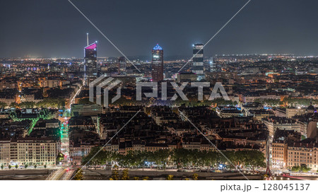 Panoramic aerial view of Lyon with skyscrapers from Fourviere Hill at night. France 128045137