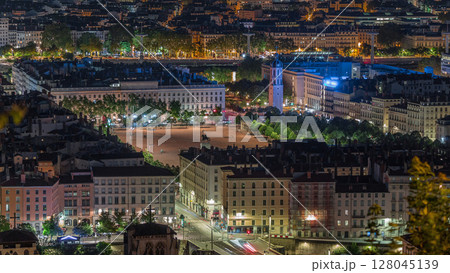 Aerial timelapse of Place Bellecour from Fourviere Hill in Lyon, France, the largest pedestrian square in Europe at night 128045139