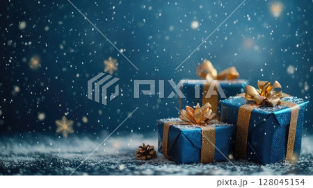 christmas presents on blue snowy winter background 128045154