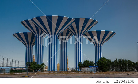 Blue and white water towers in Kuwait timelapse hyperlapse, Middle East 128045179
