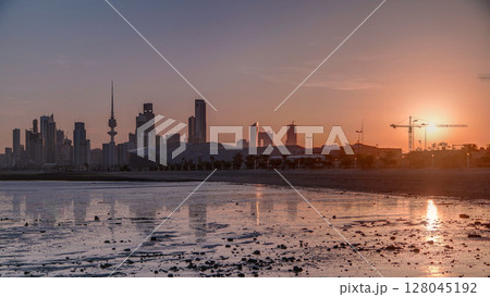Seaside skyline of Kuwait city sunrise timelapse Seaside skyline of Kuwait city sunrise timelapse 128045192