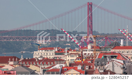 Aerial view towards Barrio Alto and 25th of April Bridge timelapse, Lisbon, Portugal. 128045257