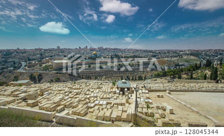 Panoramic view on Jerusalem timelapse hyperlapse with the Dome of the Rock from the Mount of Olives. Panoramic view on Jerusalem timelapse hyperlapse with the Dome of the Rock from the Mount of Olives. 128045344