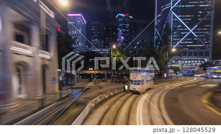View from double-decker tram on street of HK timelapse hyperlapse. 128045529